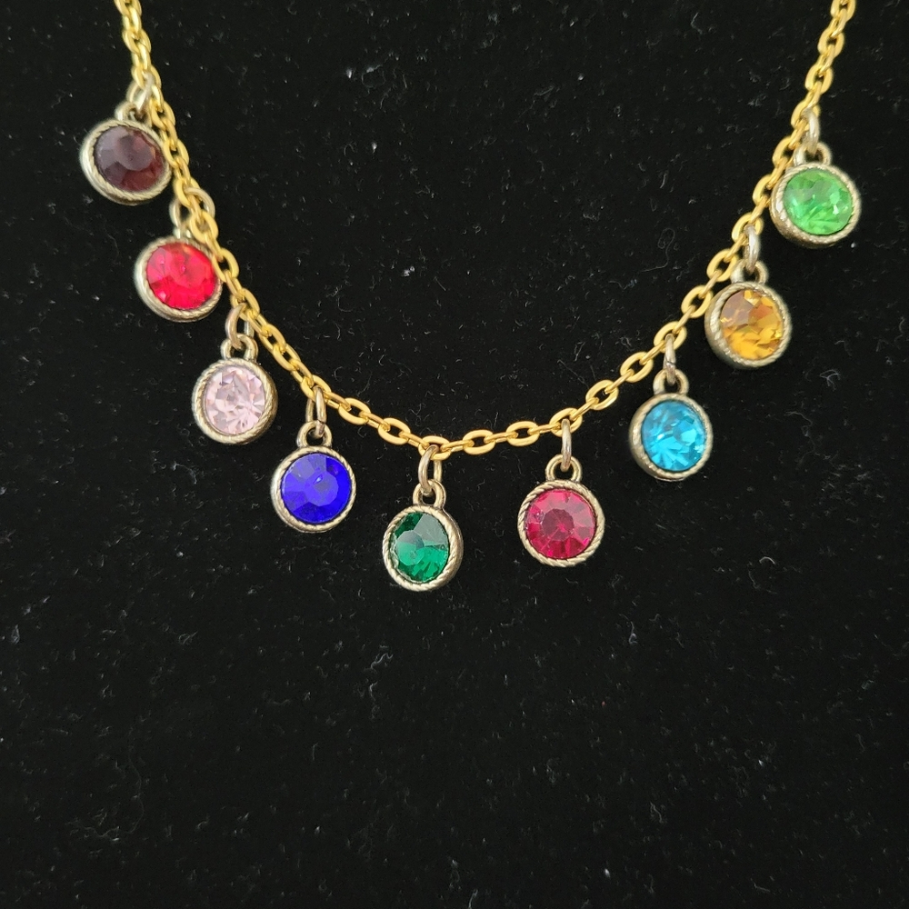 Gold toned multi colored stone charm necklace